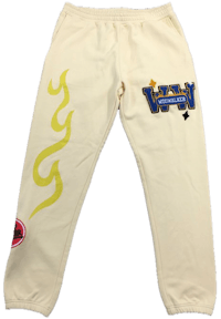 a white sweatpants with yellow flames on them